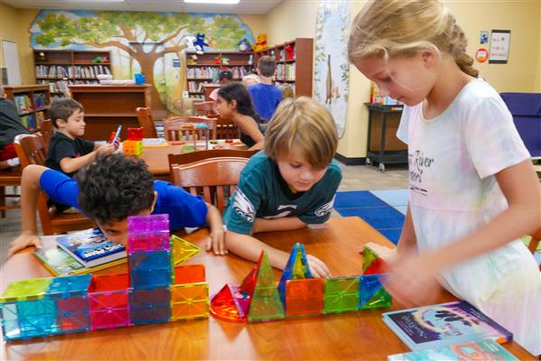 students with colorful blocks